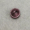 Botón circular con 2 orificios color rojizo, diámetro de 1 cm (precio por botón)