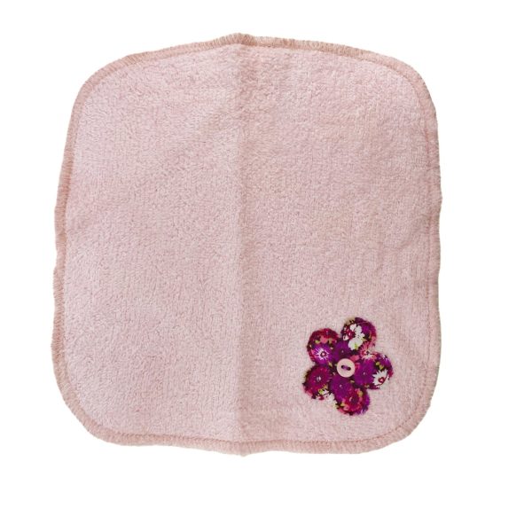 Toalla facial con aplicación de tela